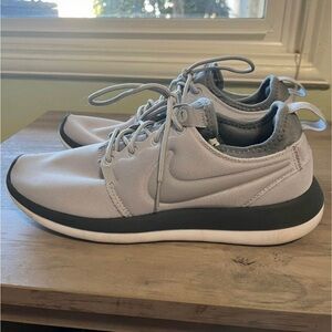 Grey Nike gym shoes